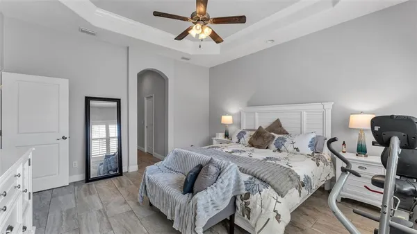 a bedroom with bed and window