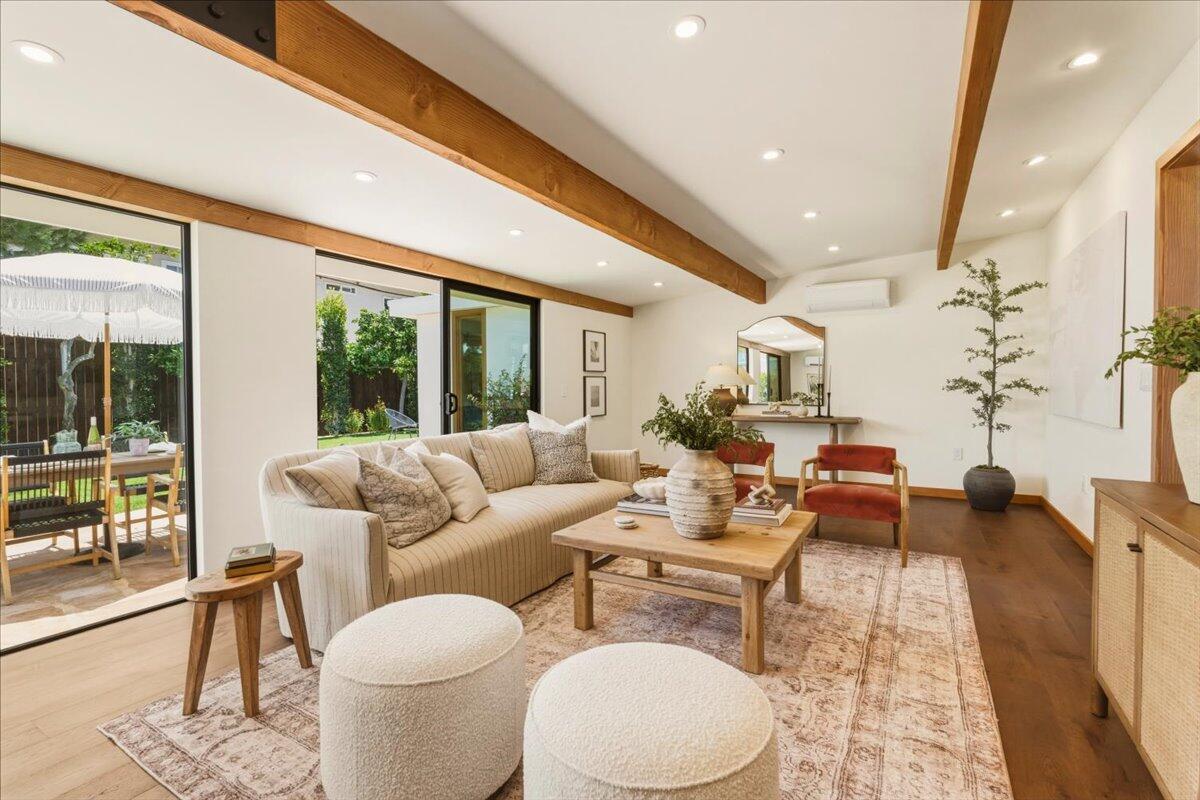 151 Kinman Avenue Goleta, CA 93117 - Photo 3 of 20 a living room with furniture and a large window