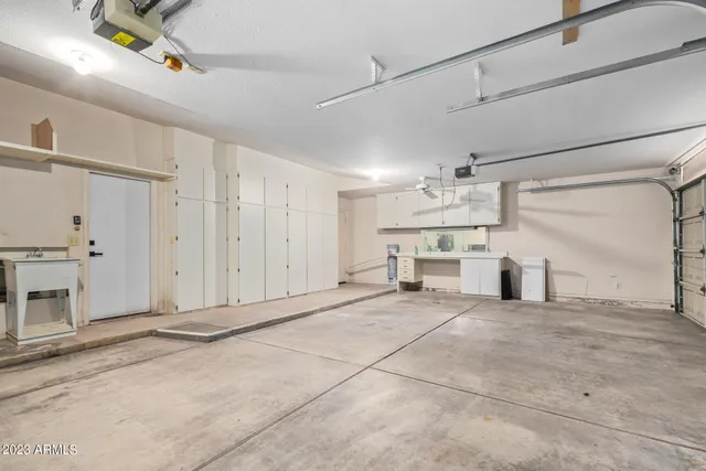 a view of a backyard of the house