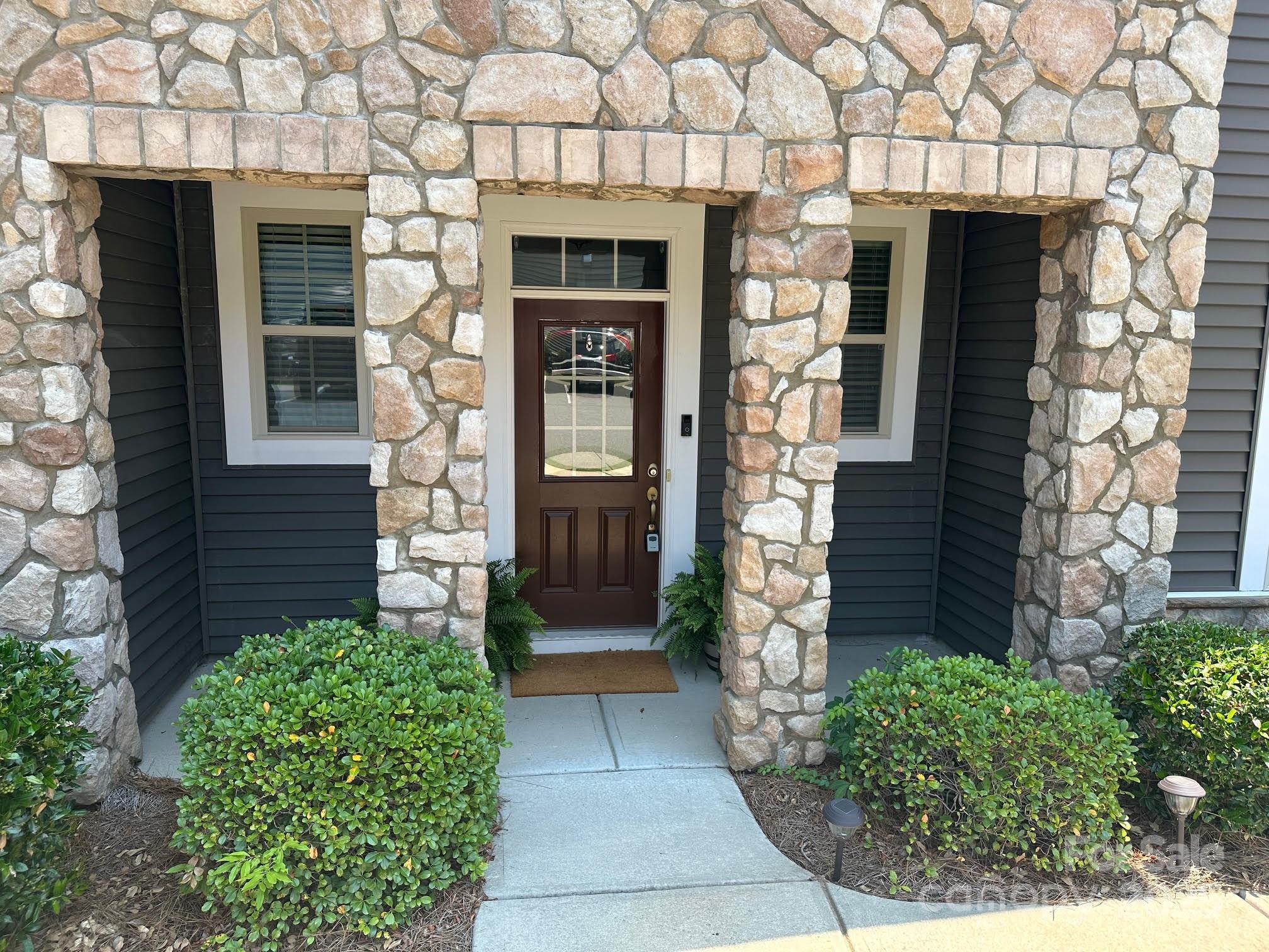 1019 Archibald Avenue Fort Mill, SC 29708 - Photo 2 of 26 a front view of a house with a garage