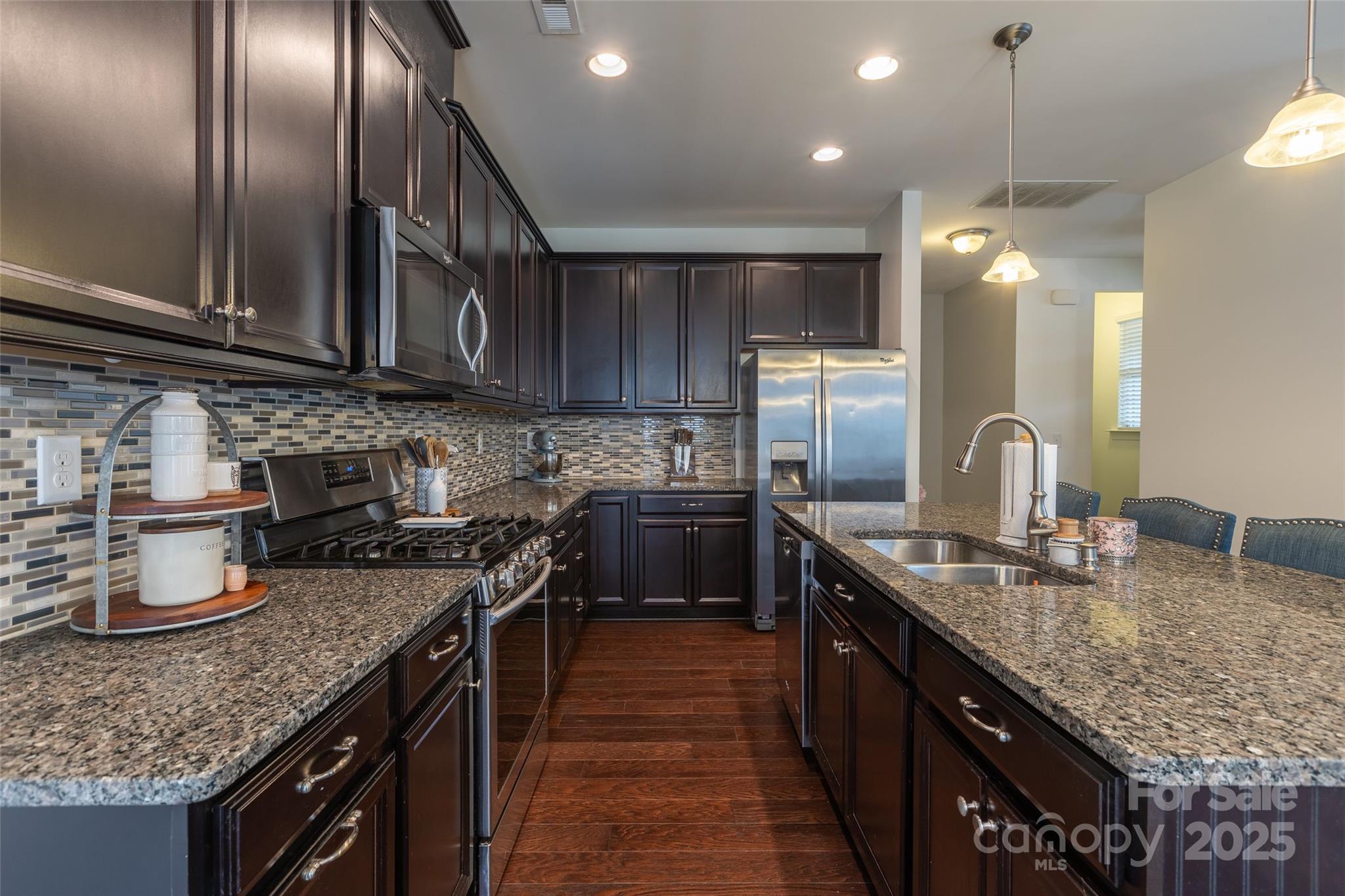 1019 Archibald Avenue Fort Mill, SC 29708 - Photo 9 of 26 a kitchen with granite countertop lots of counter top space