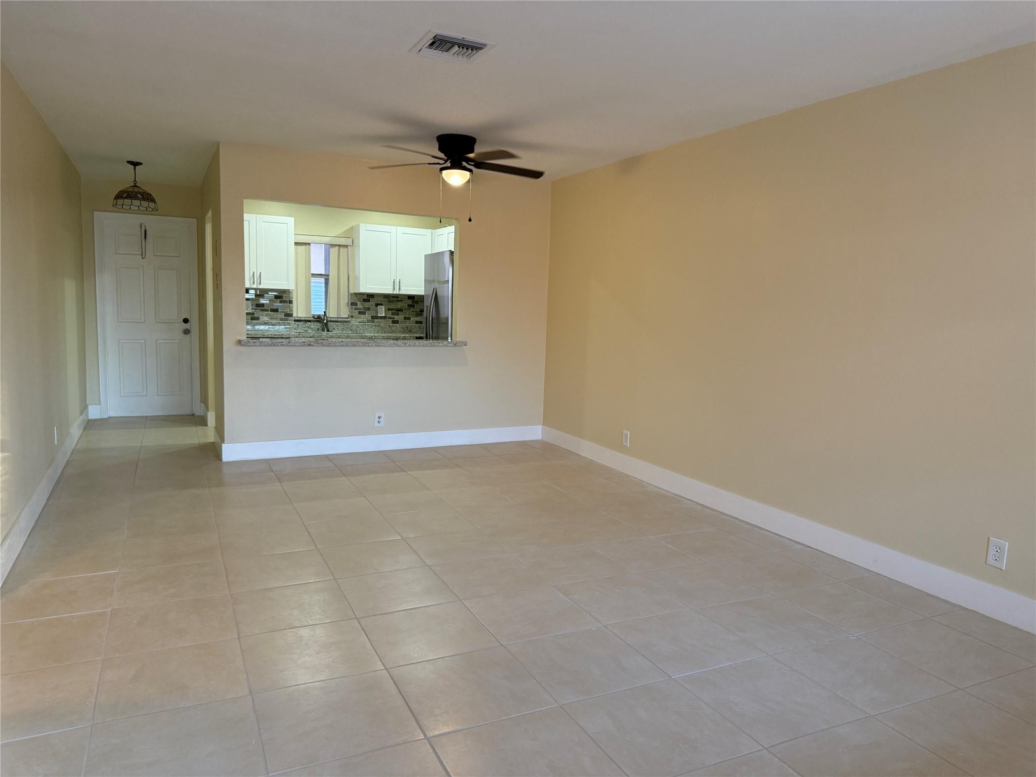 1450 North Riverside Drive, Unit 204 Pompano Beach, FL 33062 - Photo 8 of 11 Living and dining area