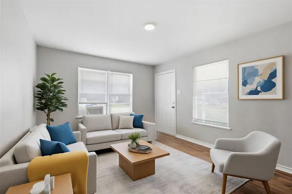a living room with furniture and a window