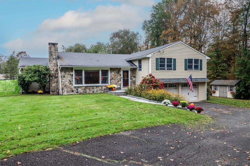 96 Codfish Hill Road Bethel, CT 06801 - Photo 1 of 1 a front view of house with yard and green space