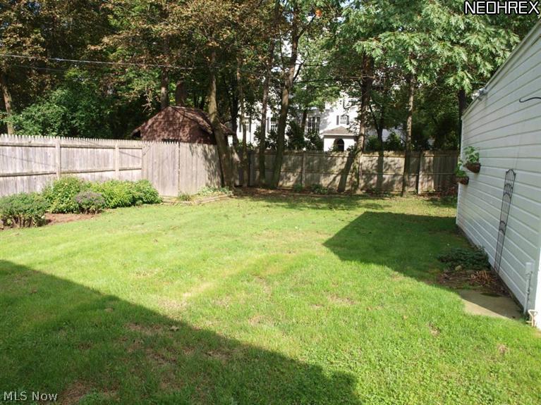 1577 Wood Road Cleveland, OH 44121 - Photo 2 of 25 Fenced in backyard