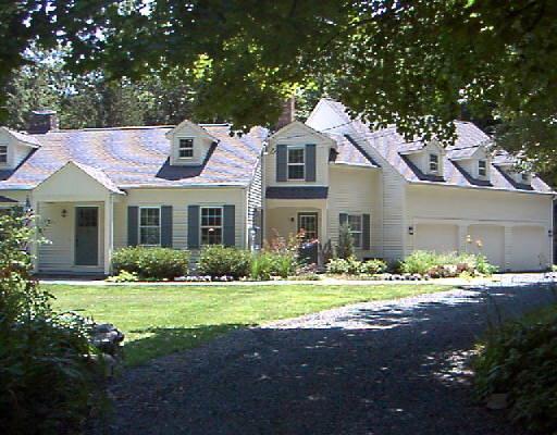 152 George Washington Highway Ridgefield, CT 06877 - Photo 1 of 1 a front view of a house with a yard