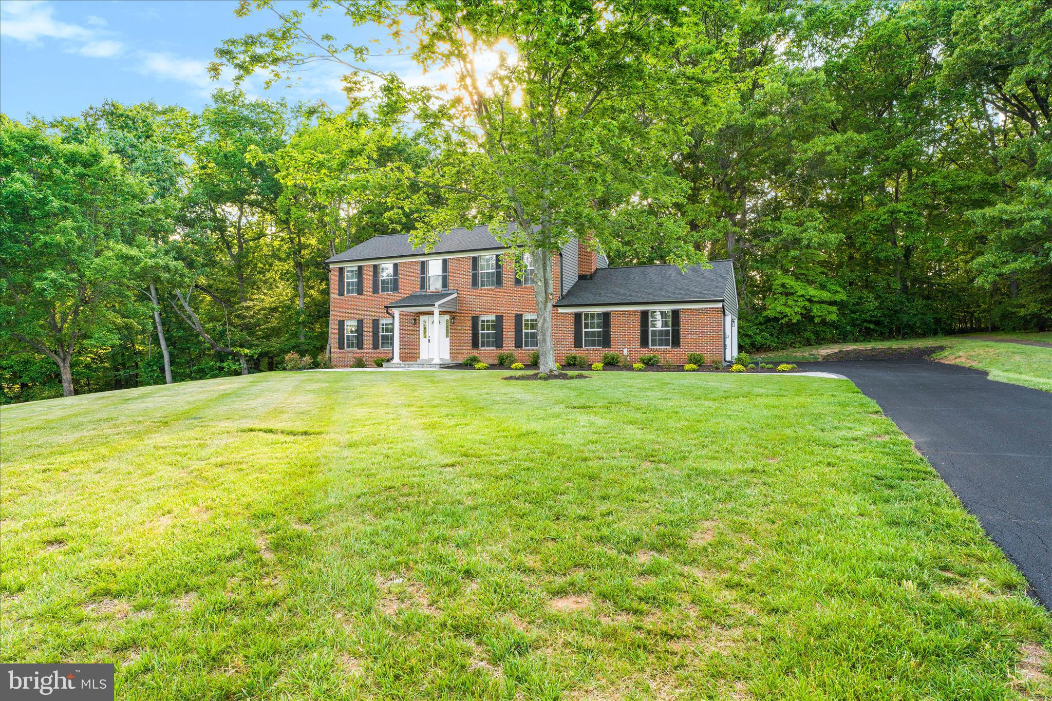 3908 Shakespeare Way Monrovia, MD 21770 - Photo 3 of 59 a front view of a house with garden