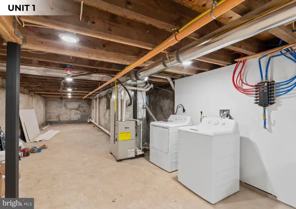 a view of storage and utility room with a sink