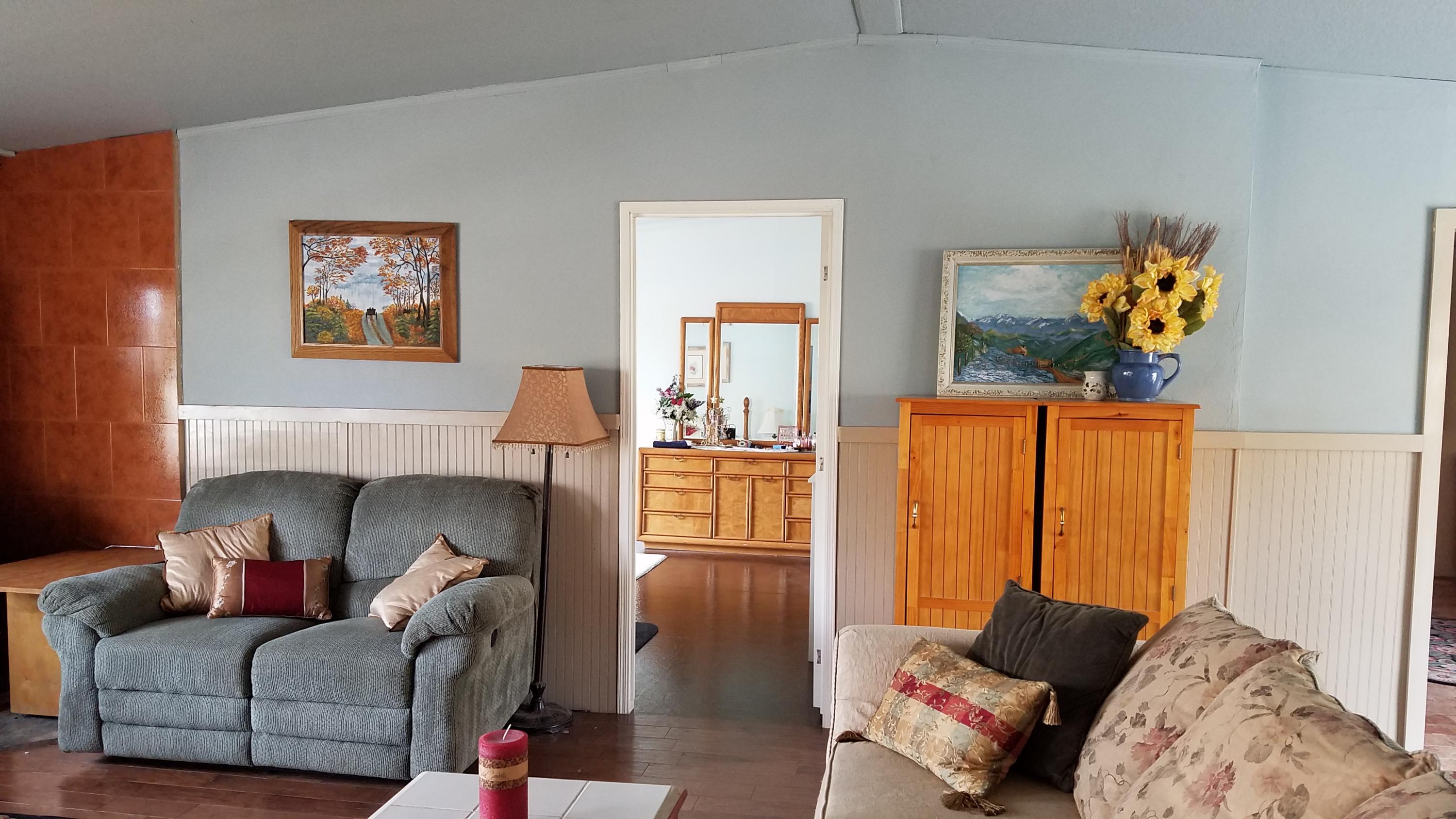 17215 Tehachapi Willow Springs Road Tehachapi, CA 93561 - Photo 16 of 45 a living room with furniture and a couch