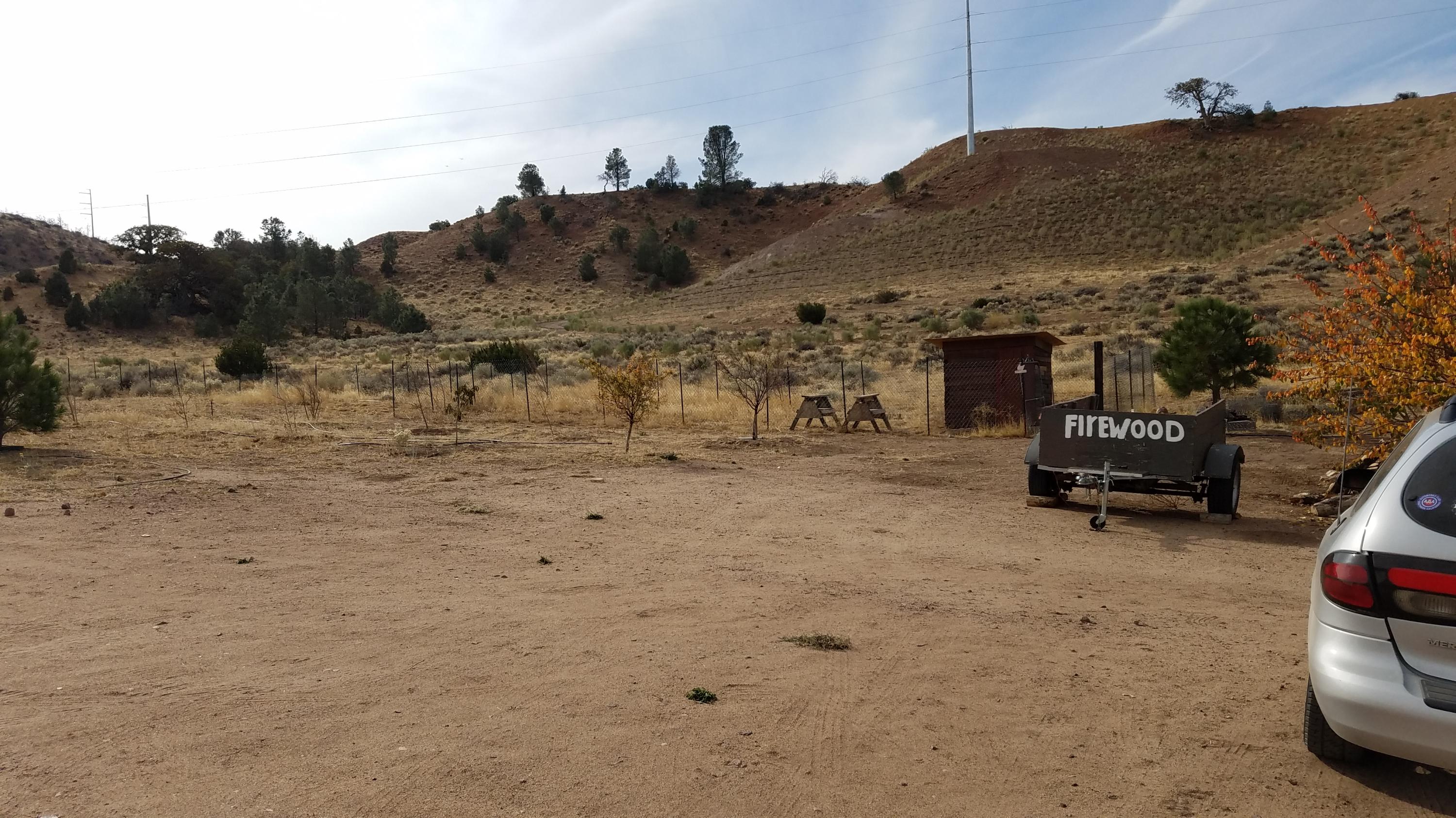 17215 Tehachapi Willow Springs Road Tehachapi, CA 93561 - Photo 33 of 45 a view of roof and car parked on road
