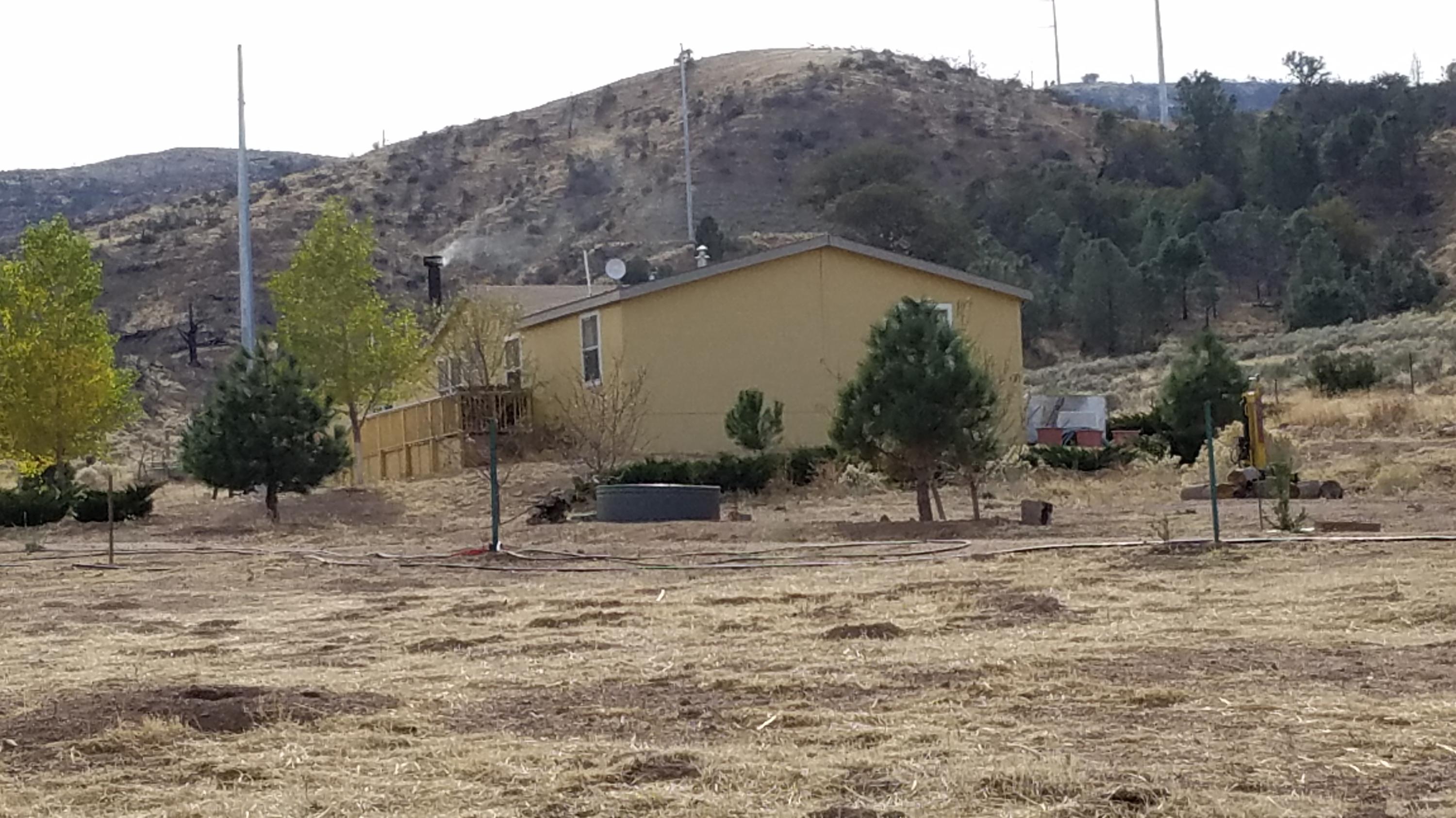 17215 Tehachapi Willow Springs Road Tehachapi, CA 93561 - Photo 43 of 45 a view of house with a outdoor space