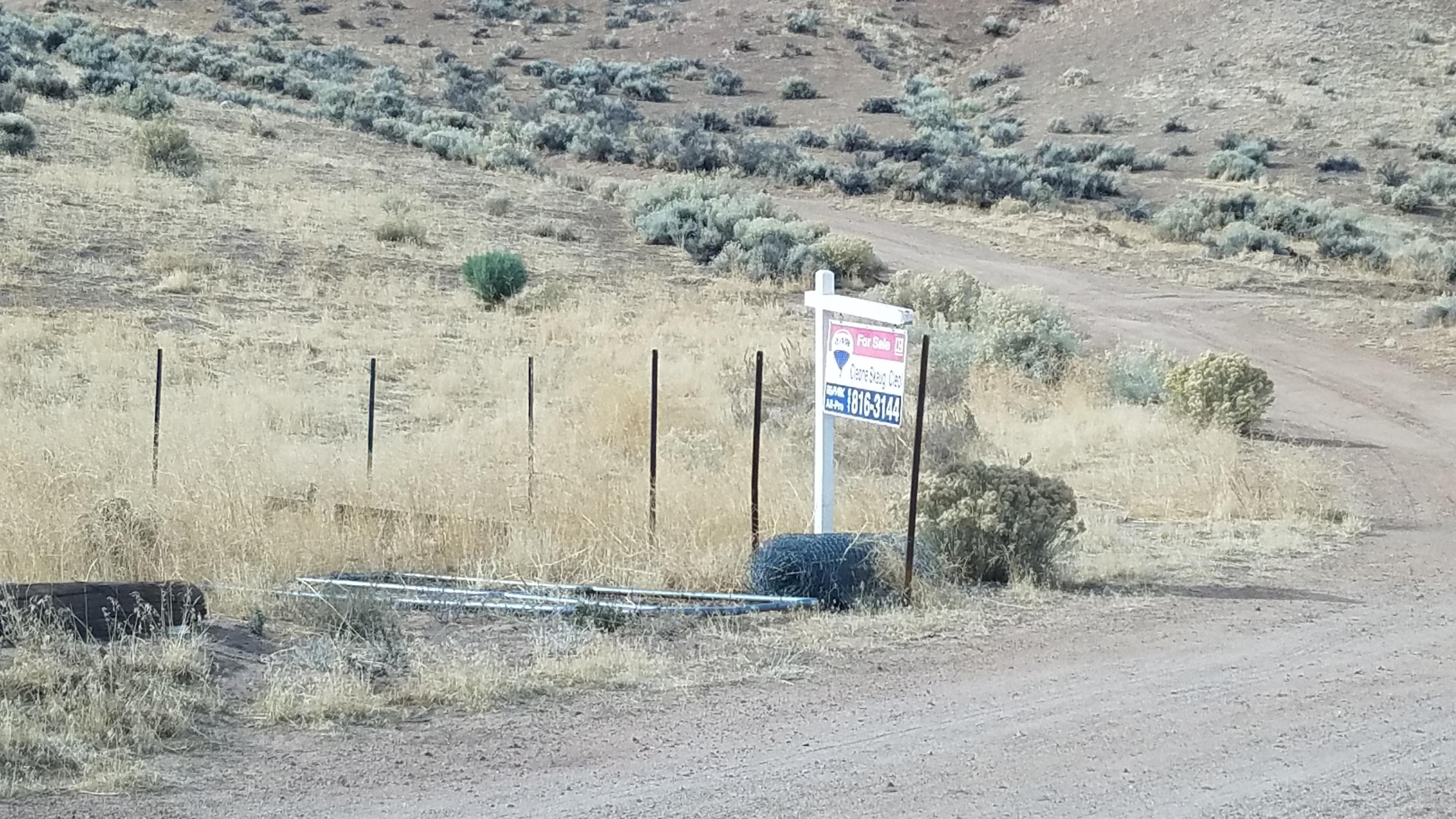 17215 Tehachapi Willow Springs Road Tehachapi, CA 93561 - Photo 45 of 45 a view of a road with a rock