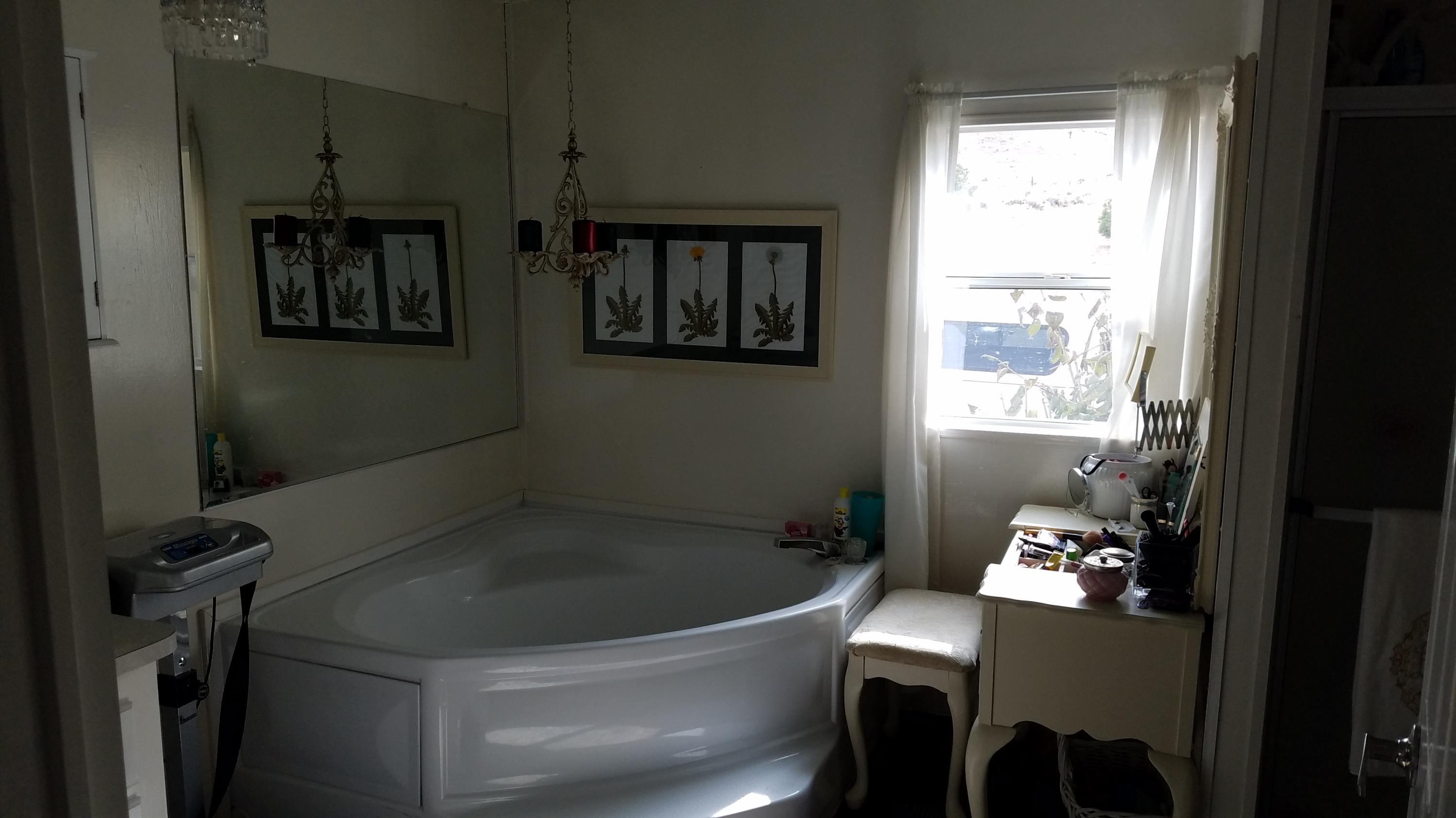 17215 Tehachapi Willow Springs Road Tehachapi, CA 93561 - Photo 6 of 45 a bathroom with a table and chair