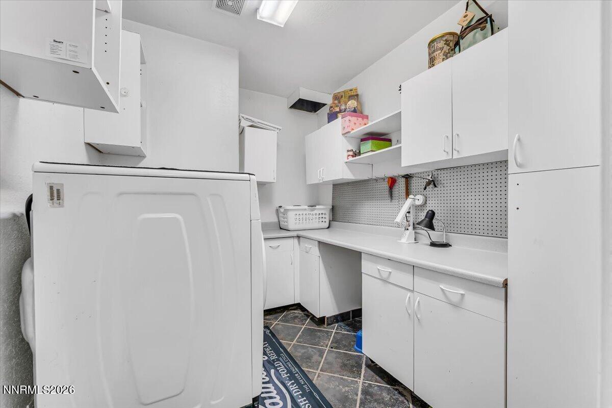15770 Rocky Vista Road Reno, NV 89521 - Photo 31 of 68 a kitchen with refrigerator and sink