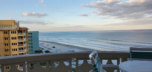 a view of a building from a chairs
