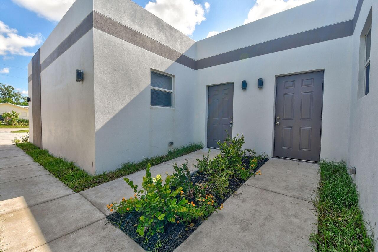1177 AC Evans Street, Unit A Riviera Beach, FL 33404 - Photo 1 of 1 FRONT BUILDING