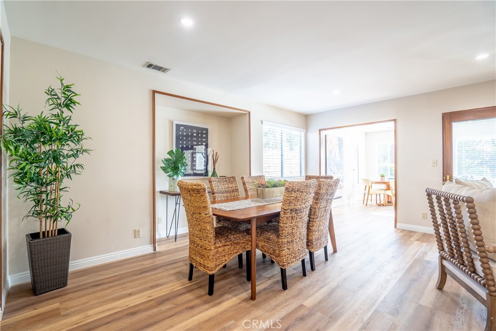 3610 Cartwright Street Pasadena, CA 91107 - Photo 15 of 75 a view of a dining room with furniture window and wooden floor
