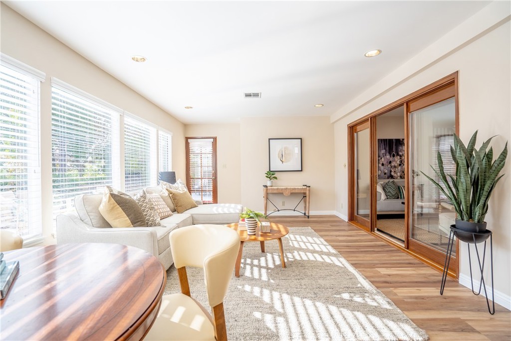 3610 Cartwright Street Pasadena, CA 91107 - Photo 19 of 75 a living room with furniture and a potted plant