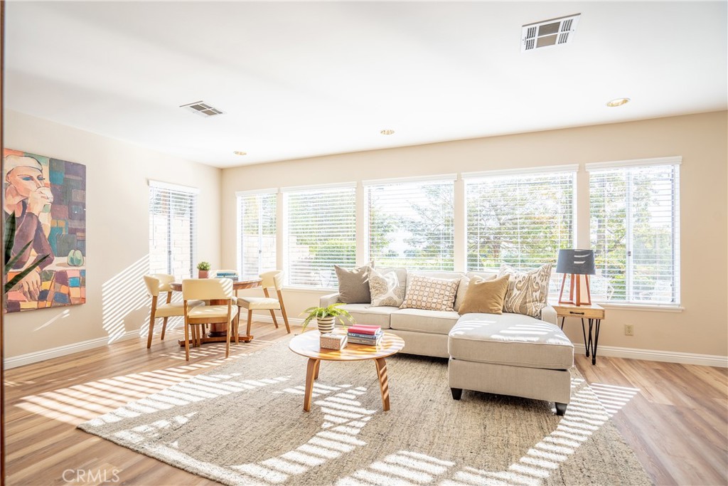 3610 Cartwright Street Pasadena, CA 91107 - Photo 20 of 75 a living room with furniture and large windows