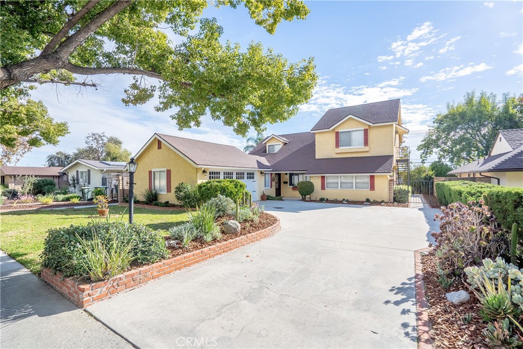 3610 Cartwright Street Pasadena, CA 91107 - Photo 2 of 75 a front view of a house with a yard