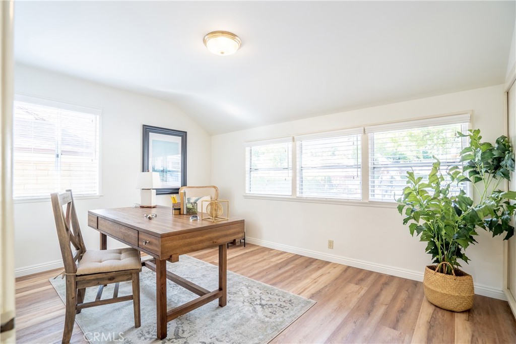 3610 Cartwright Street Pasadena, CA 91107 - Photo 23 of 75 a view of a dining room with furniture window and wooden floor