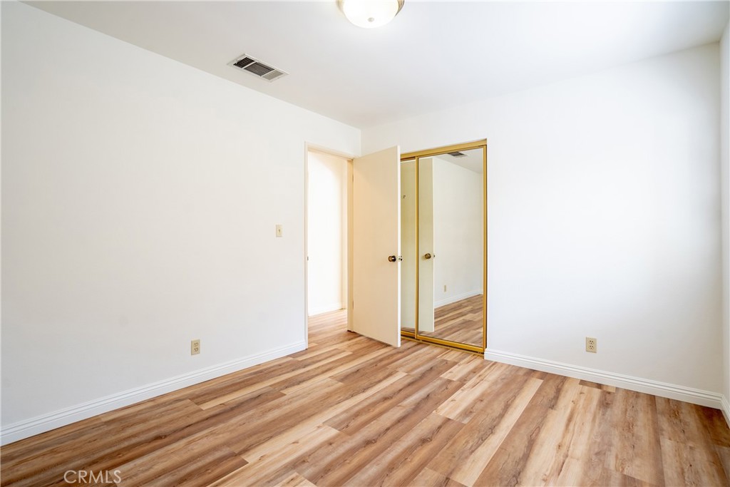 3610 Cartwright Street Pasadena, CA 91107 - Photo 25 of 75 a view of a room with wooden floor and bathroom