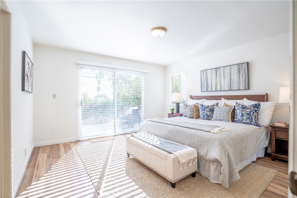 3610 Cartwright Street Pasadena, CA 91107 - Photo 27 of 75 a bedroom with a large bed and a large window