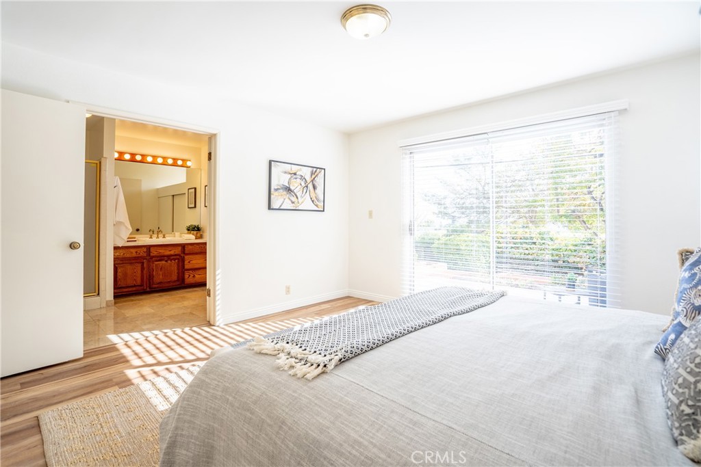 3610 Cartwright Street Pasadena, CA 91107 - Photo 31 of 75 a bedroom with a bed and a large window