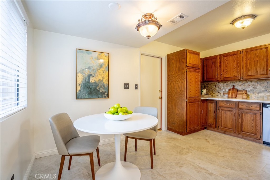 3610 Cartwright Street Pasadena, CA 91107 - Photo 36 of 75 a kitchen with a table and chairs in it