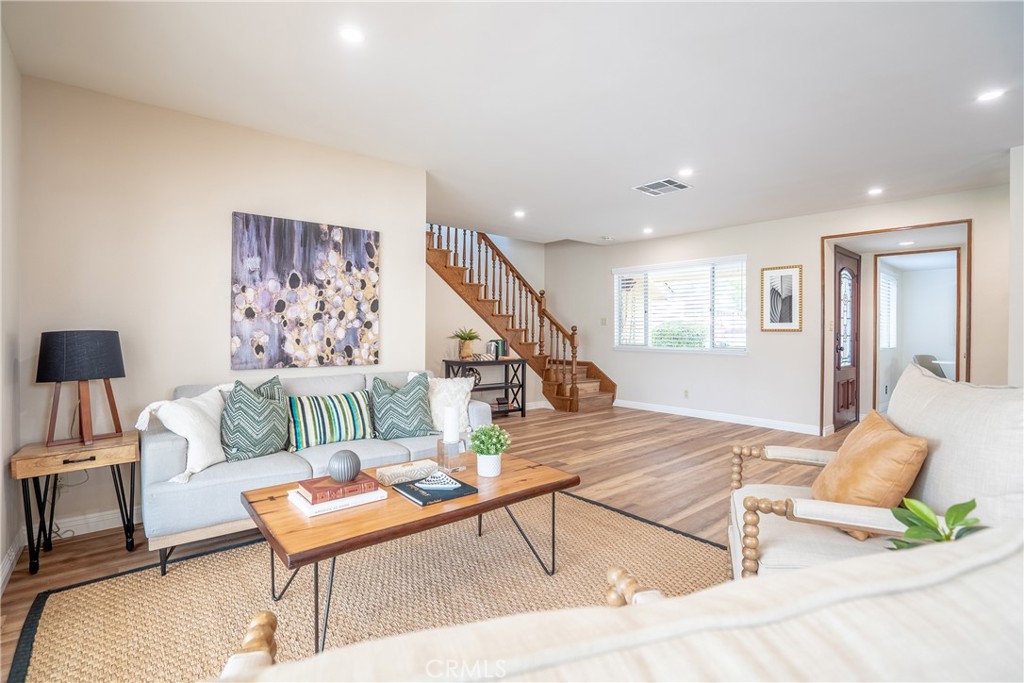 3610 Cartwright Street Pasadena, CA 91107 - Photo 47 of 75 a living room with furniture and a wooden floor