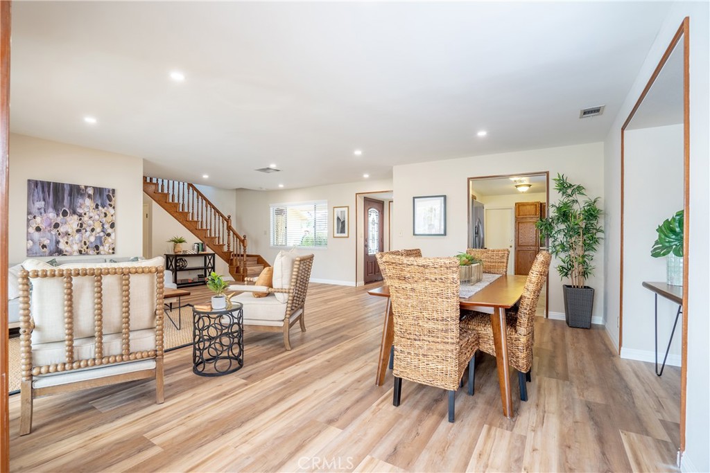 3610 Cartwright Street Pasadena, CA 91107 - Photo 48 of 75 a dining room with wooden floor and large windows