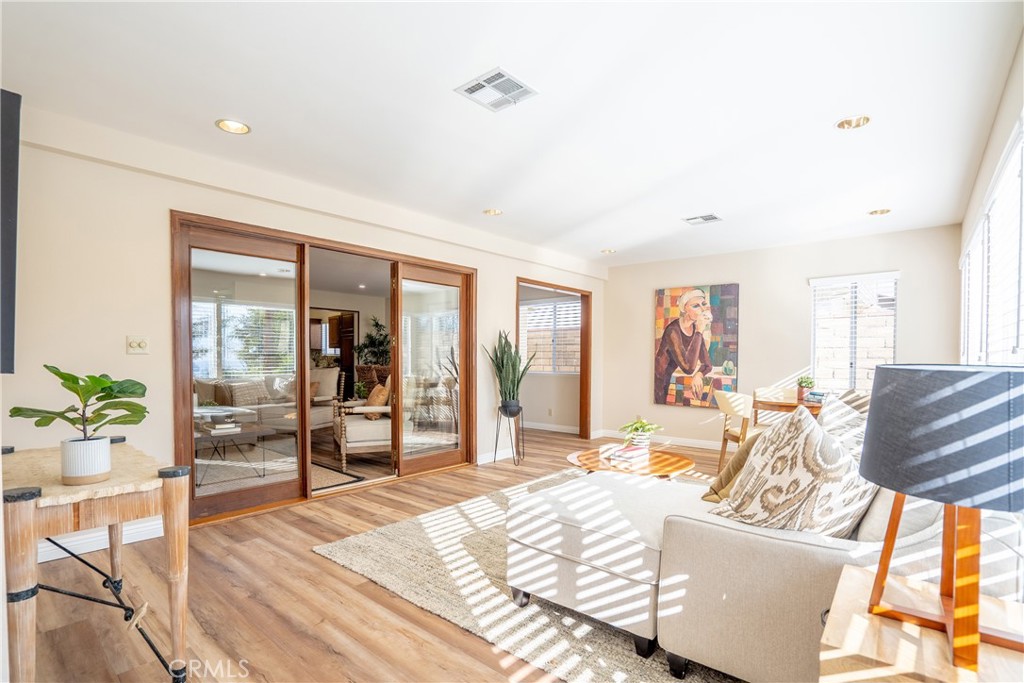 3610 Cartwright Street Pasadena, CA 91107 - Photo 50 of 75 a living room with furniture and wooden floor
