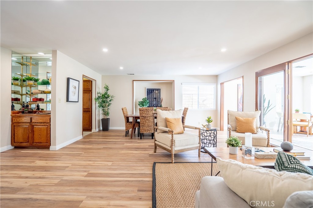 3610 Cartwright Street Pasadena, CA 91107 - Photo 52 of 75 a living room with furniture large window and wooden floor