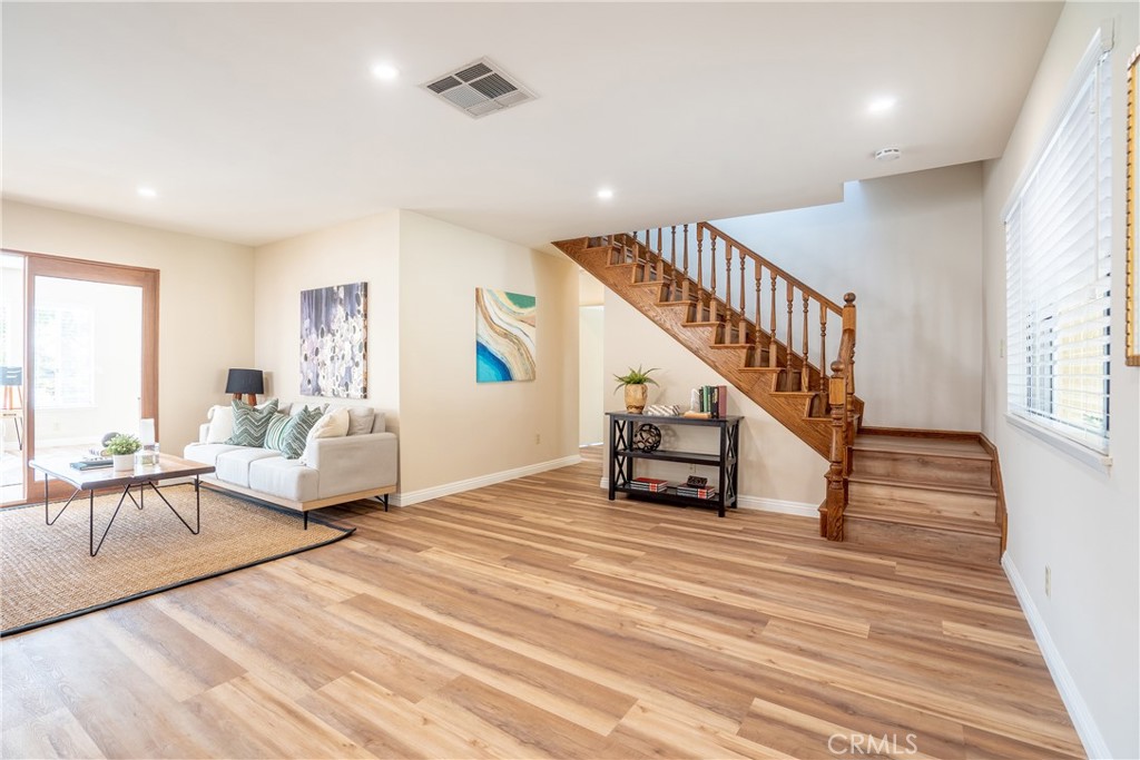3610 Cartwright Street Pasadena, CA 91107 - Photo 53 of 75 a living room with furniture and stairs