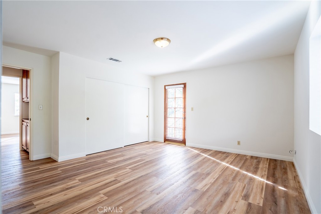3610 Cartwright Street Pasadena, CA 91107 - Photo 58 of 75 a view of an empty room and wooden floor