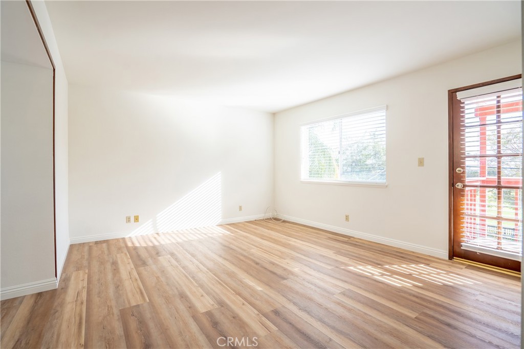 3610 Cartwright Street Pasadena, CA 91107 - Photo 60 of 75 an empty room with wooden floor and windows