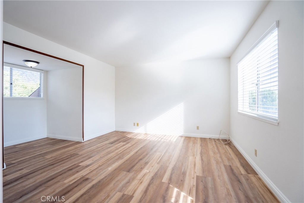 3610 Cartwright Street Pasadena, CA 91107 - Photo 61 of 75 wooden floor in an empty room with a window