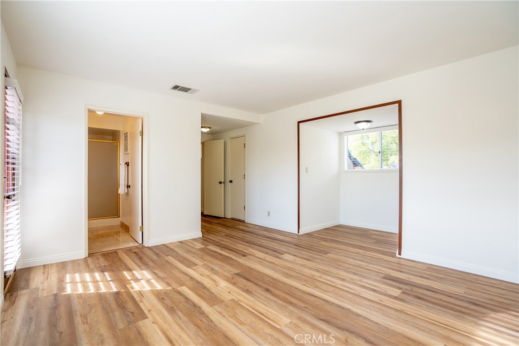 3610 Cartwright Street Pasadena, CA 91107 - Photo 63 of 75 a view of a room with wooden floor and bathroom
