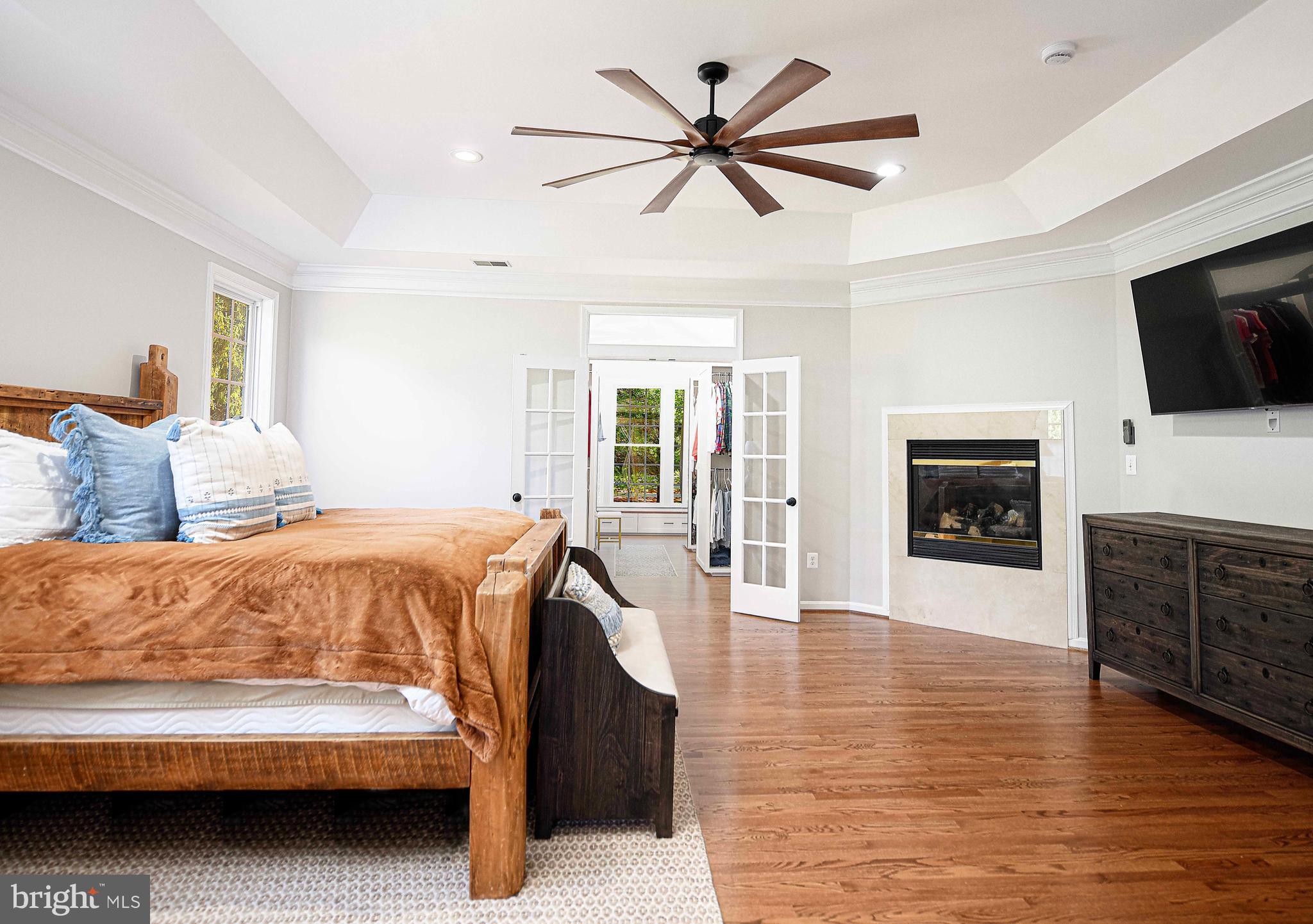 14516 Cuba Road Cockeysville, MD 21030 - Photo 42 of 79 a spacious bedroom with a bed and a flat screen tv