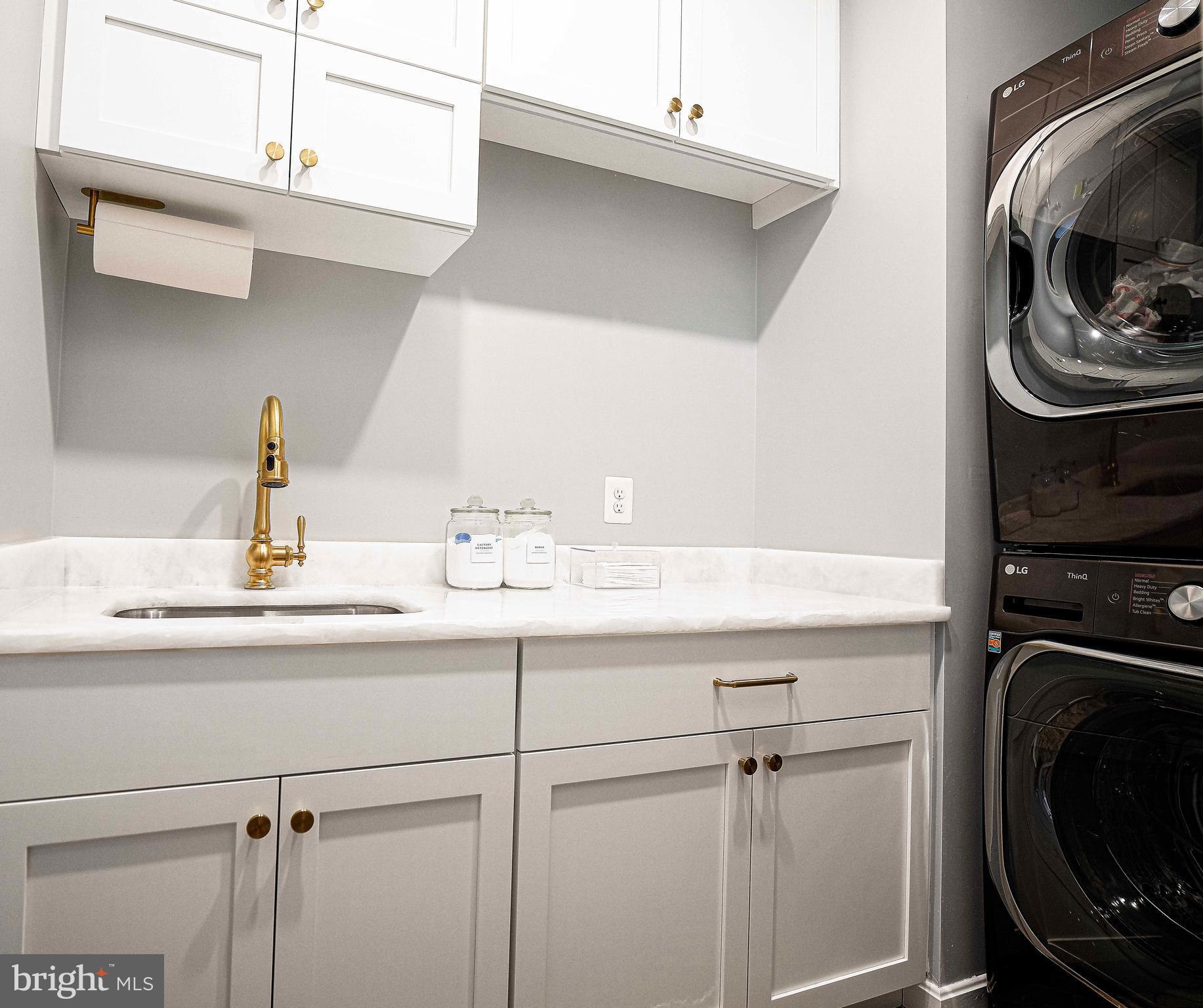 14516 Cuba Road Cockeysville, MD 21030 - Photo 54 of 79 a bathroom with a sink and a washing machine