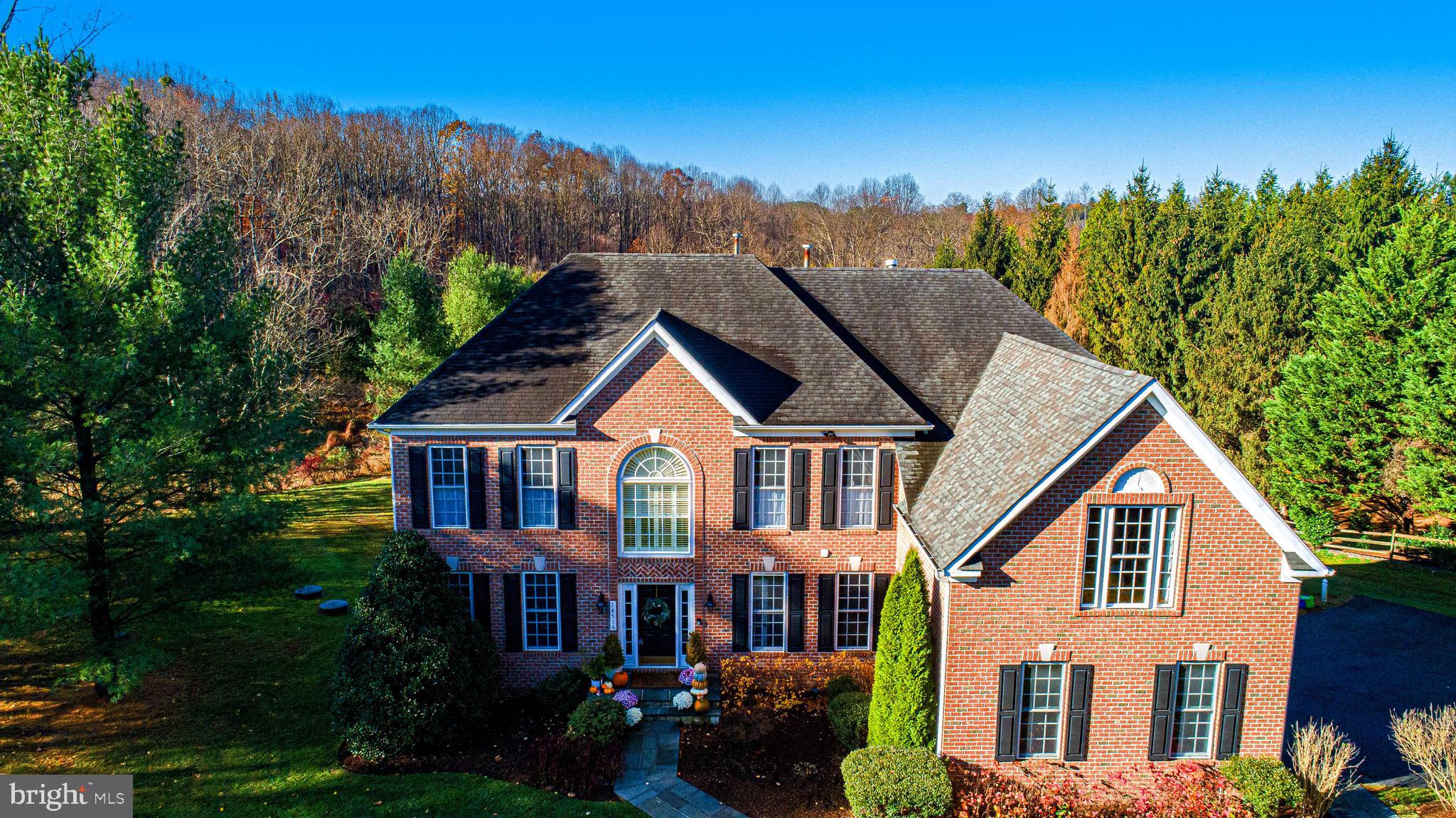 14516 Cuba Road Cockeysville, MD 21030 - Photo 10 of 79 a front view of a house with a yard and garage