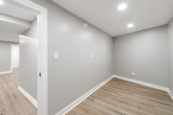 a utility room with cabinets