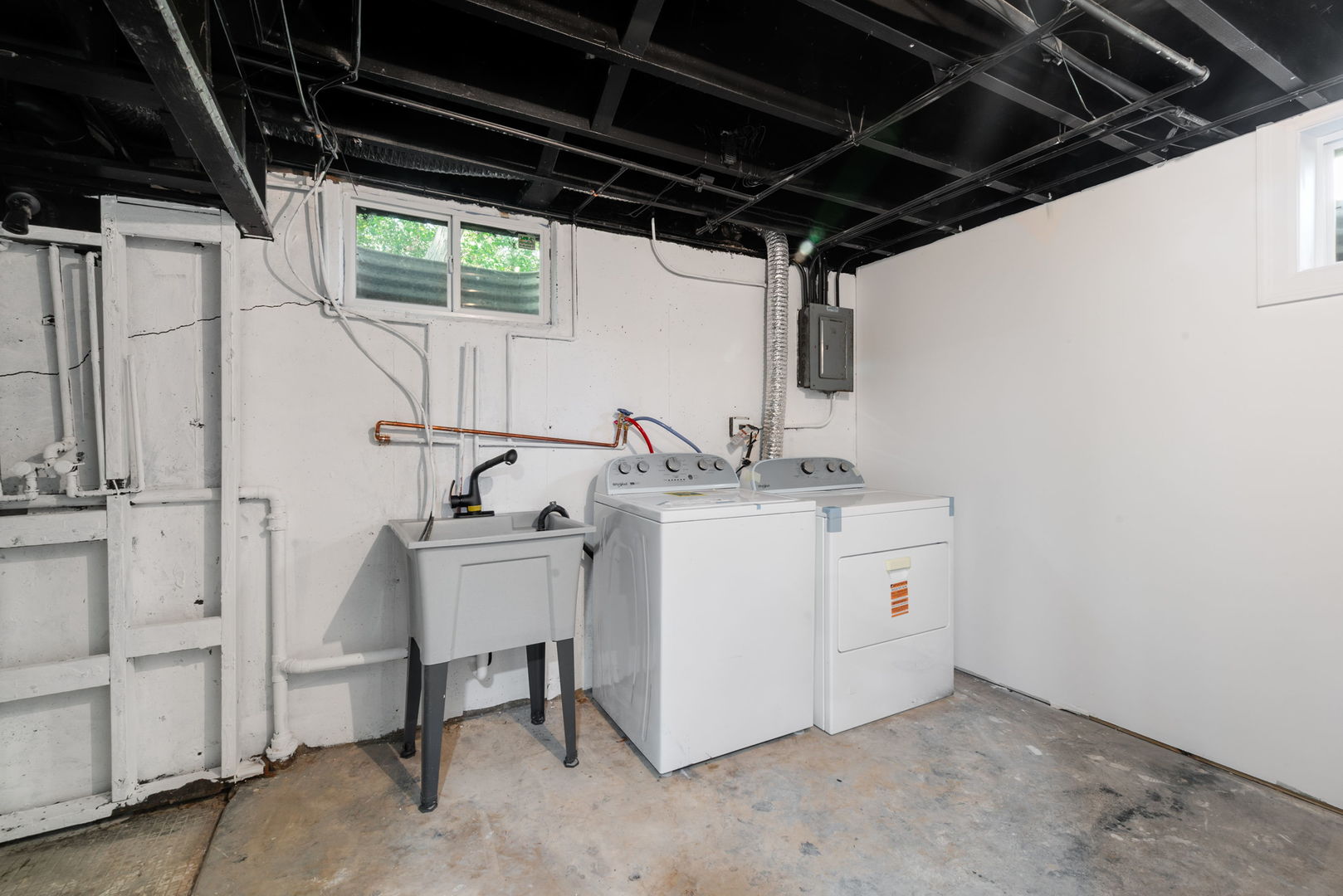 92 North Airlite Street Elgin, IL 60123 - Photo 20 of 25 a utility room with cabinets