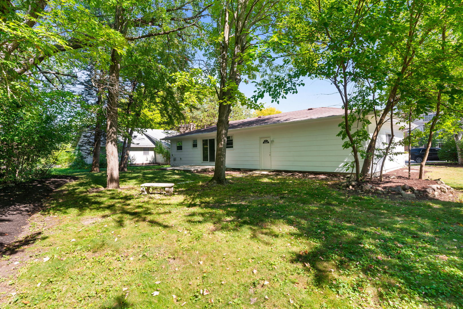 92 North Airlite Street Elgin, IL 60123 - Photo 21 of 25 a front view of a house with garden