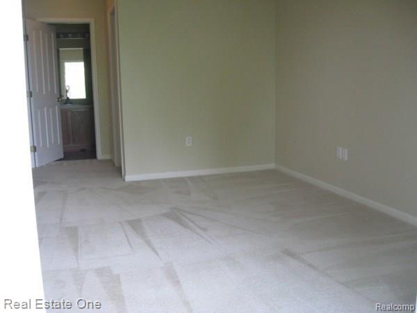 4145 Hampton Ridge Boulevard, Unit 32 Howell, MI 48843 - Photo 10 of 28 master bedroom.jpg