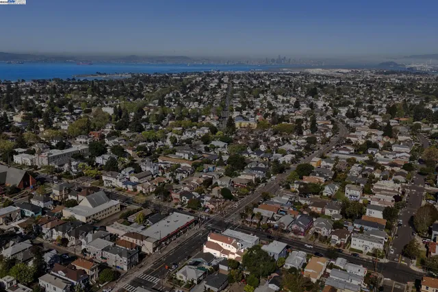 an aerial view of residential house and outdoor space