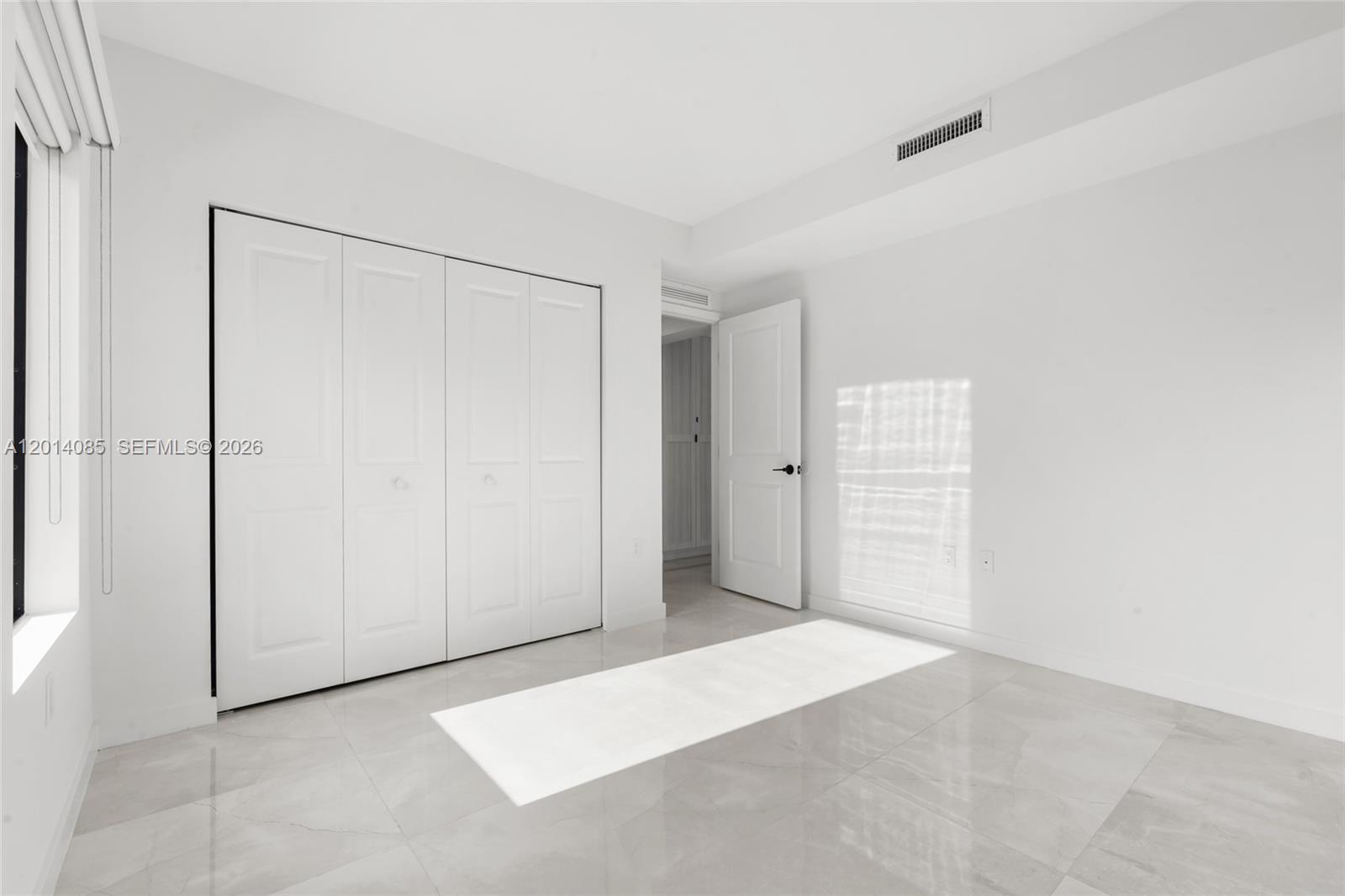 14530 Southwest 261st Terrace, Unit 1 Homestead, FL 33032 - Photo 10 of 17 a view of an empty room