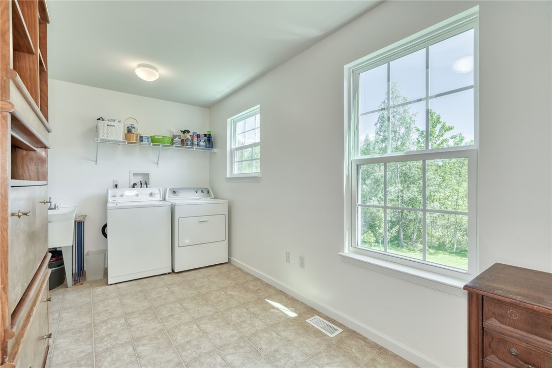32 Ashlyn Rise Penfield, NY 14450 - Photo 23 of 50 Enormous laundry room. Could be split for office