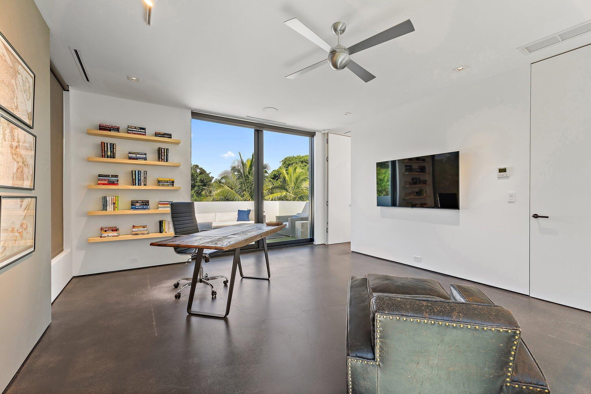 12 North Beach Road Jupiter Island, FL 33455 - Photo 35 of 95 a living room with furniture and a window
