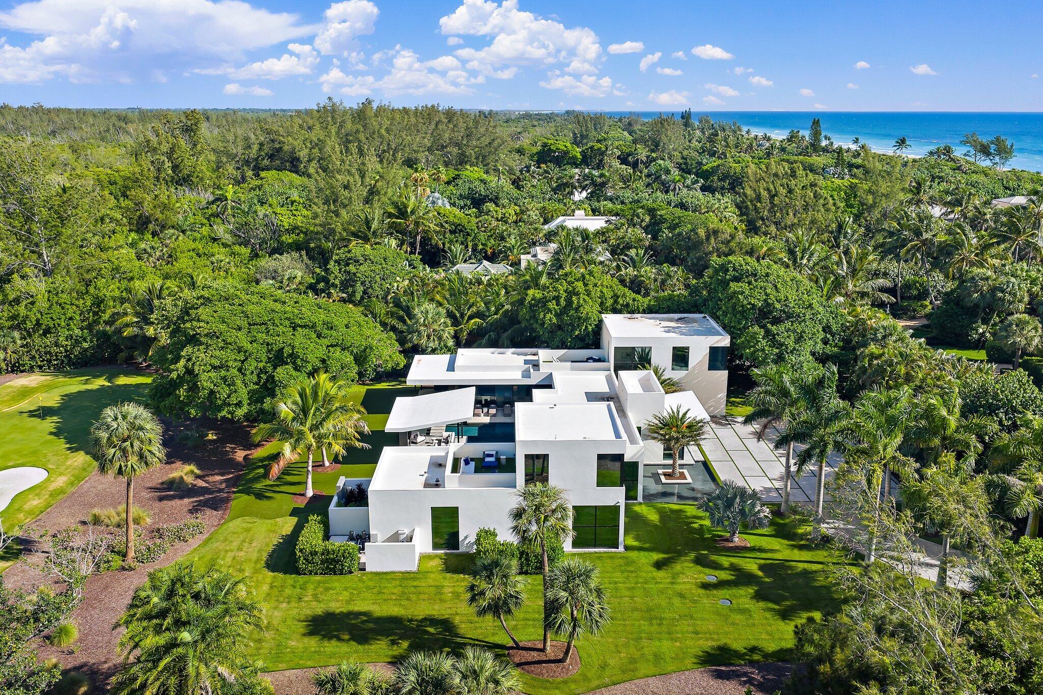 12 North Beach Road Jupiter Island, FL 33455 - Photo 61 of 95 an aerial view of a house with a yard